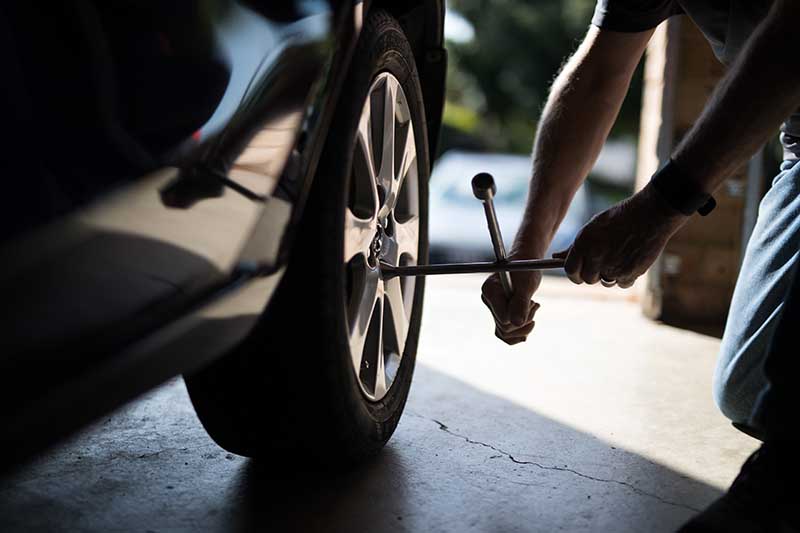 putting new tyre