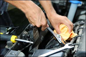 mechanic working on a car