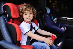 kid sitting in a car